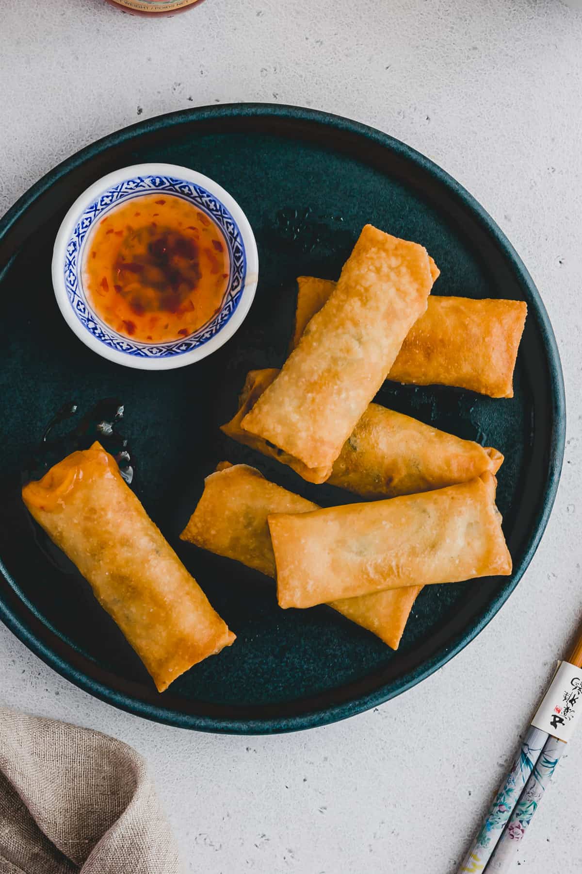 crispy thai spring rolls served with dipping sauce