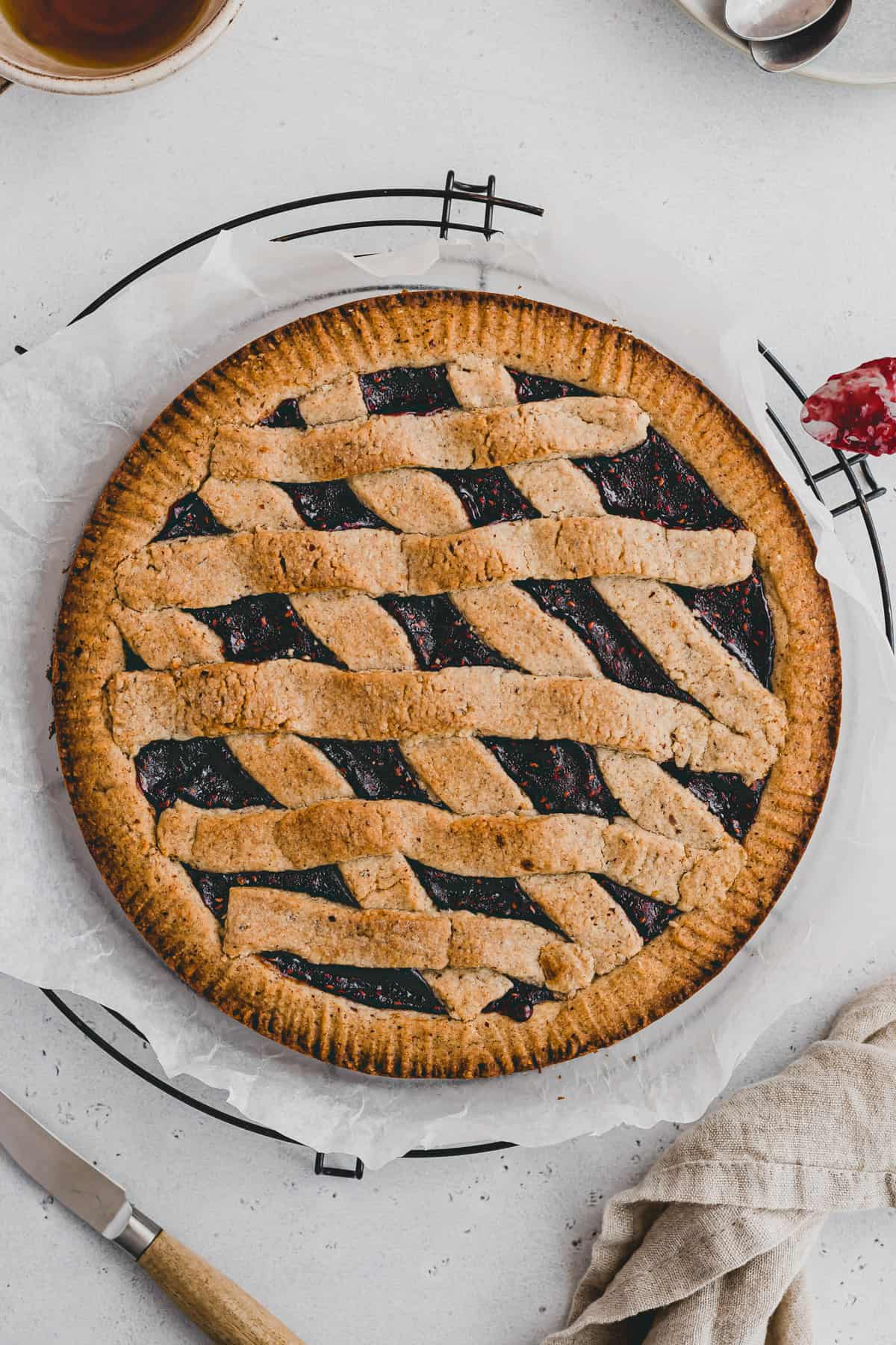 linzer torte on a wire rack