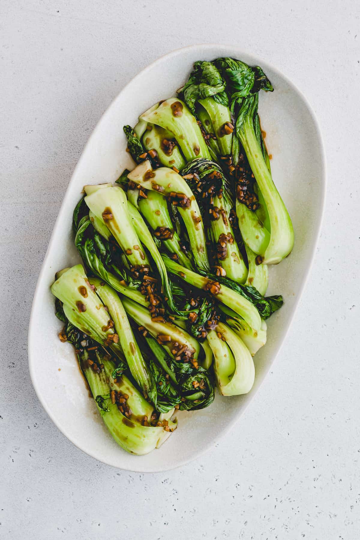 ginger garlic baby bok choy on a plate