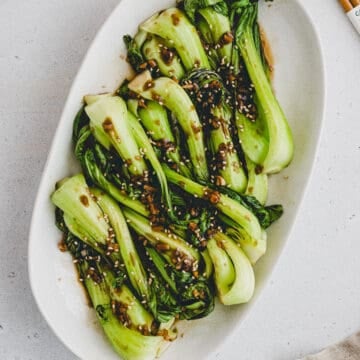 stir fried bok choy with garlic and ginger on a plate