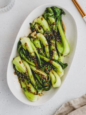 stir fried bok choy with garlic and ginger on a plate