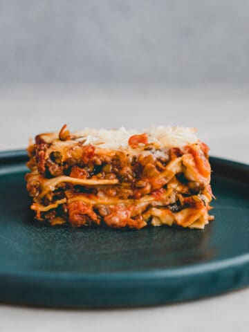 vegan lentil lasagna on a blue plate