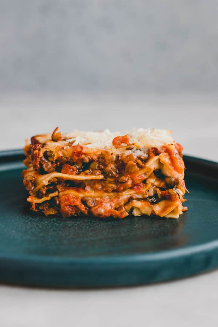 vegan lentil lasagna on a blue plate