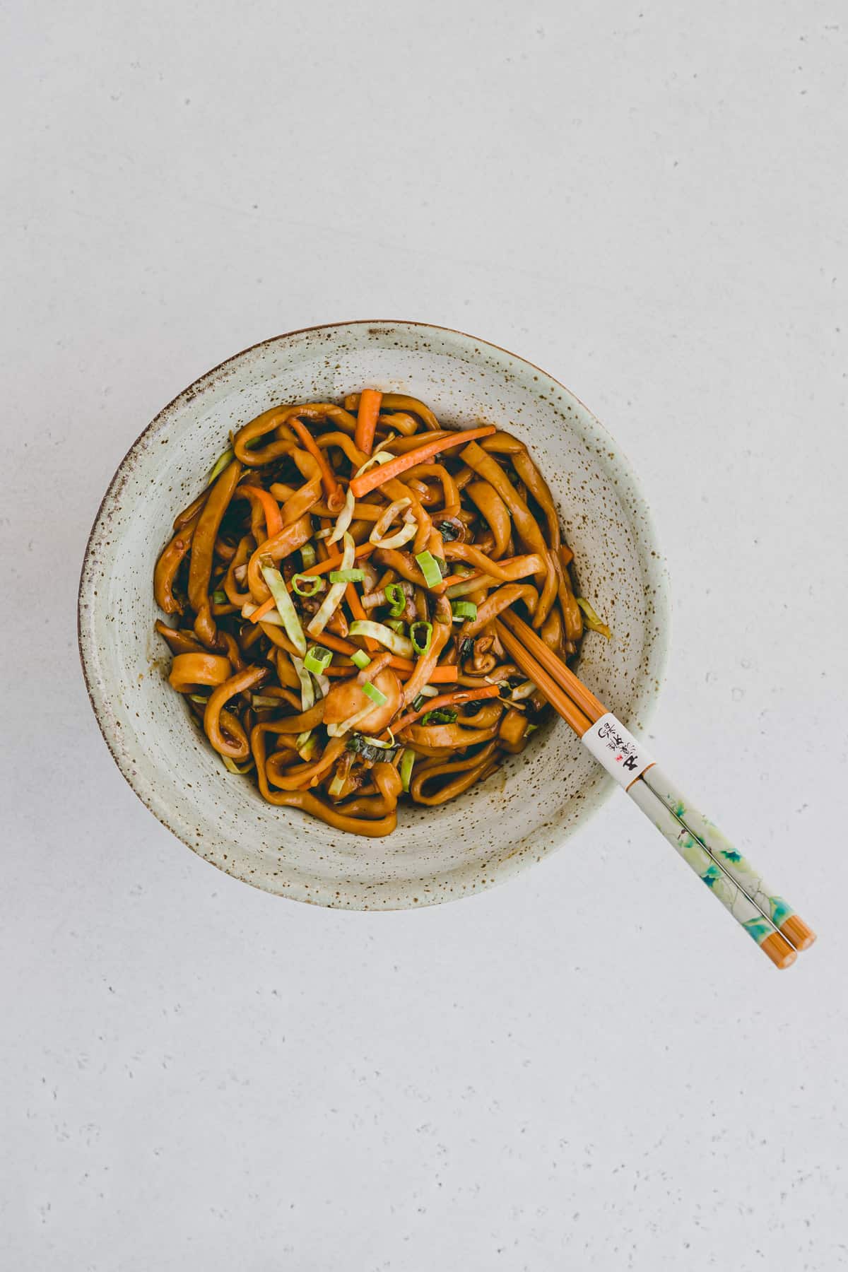 yaki udon noodles with vegetable in a bowl