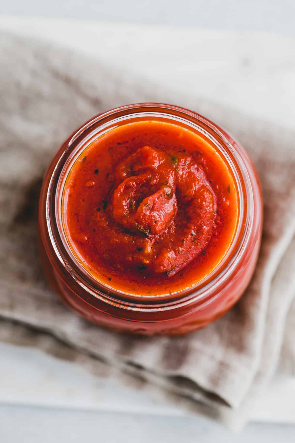 easy homemade pizza sauce in a mason jar