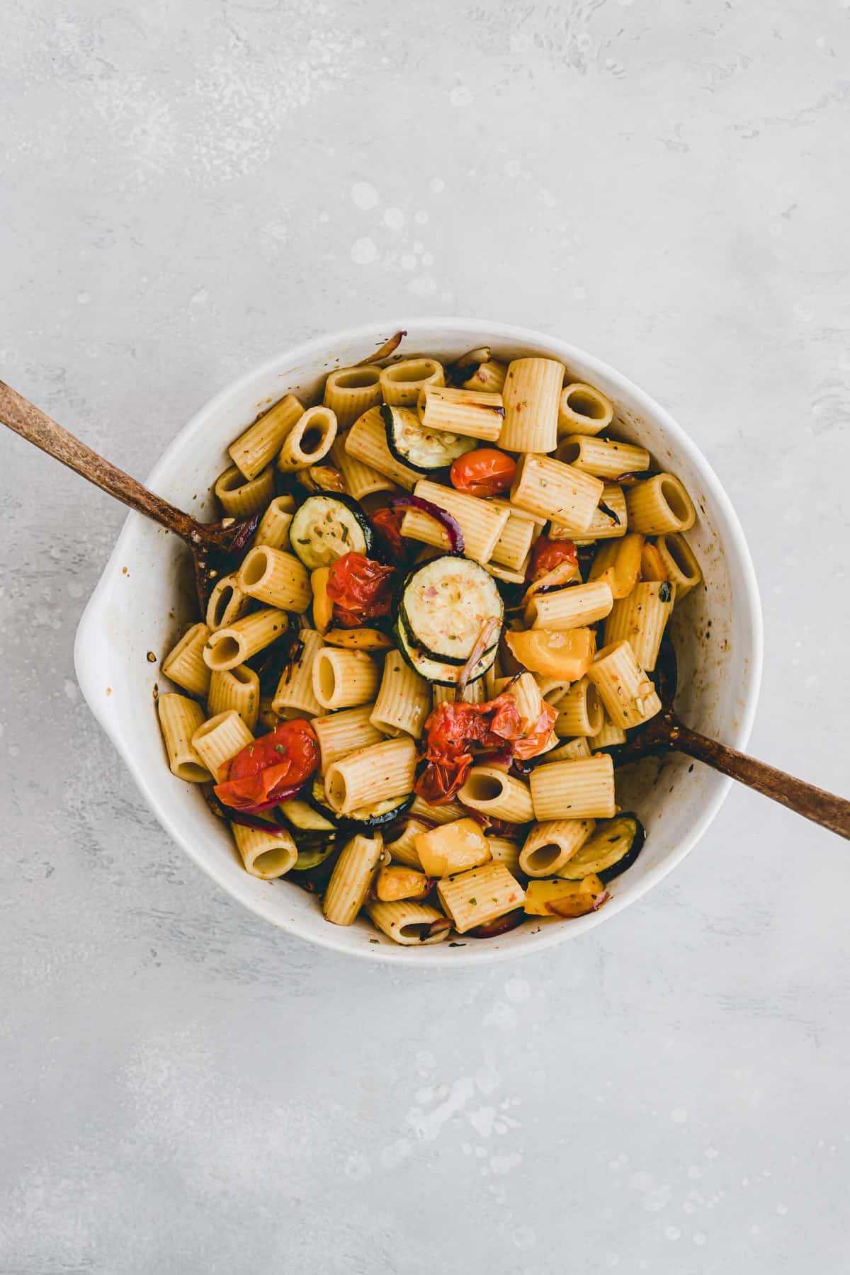 marinated pasta salad with vegetables in a salad bowl