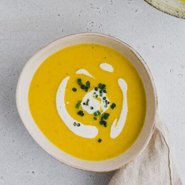 vegan leek potato soup decorated with chives