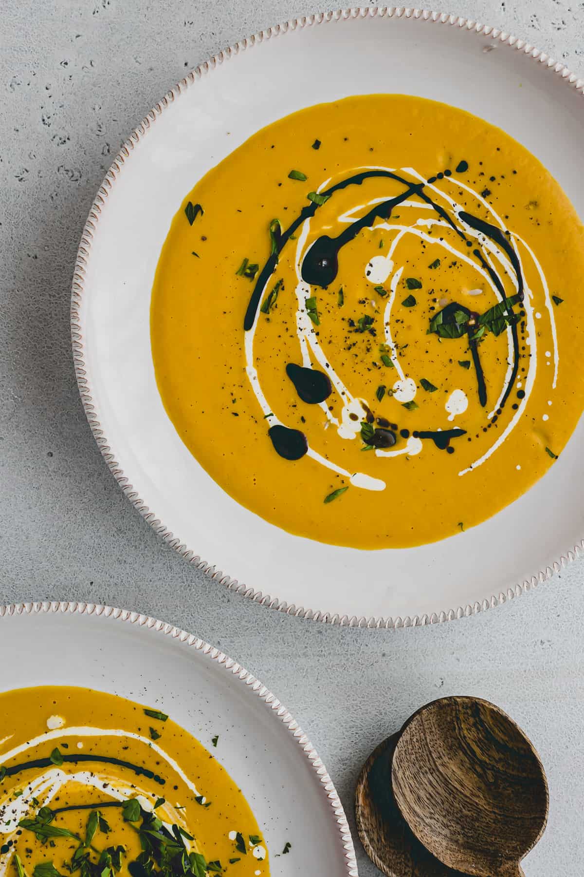 a bowl full of kuri squash soup