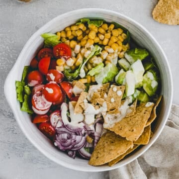 vegan taco salad in a bowl with crunchy tortilla chips