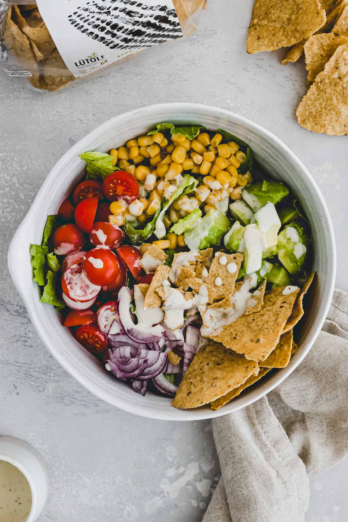 vegan taco salad in a bowl with crunchy tortilla chips