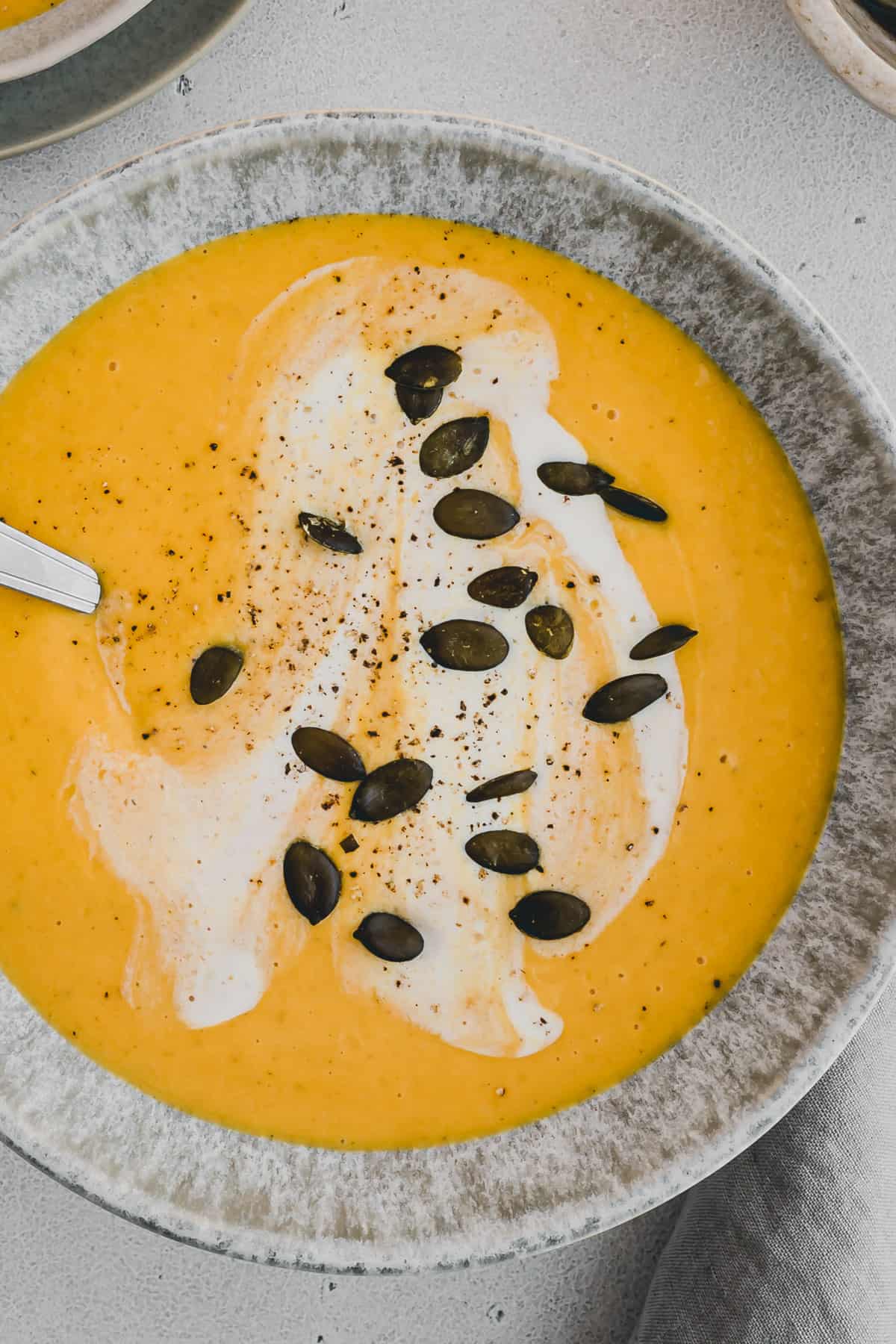 butternut squash apple soup in a bowl