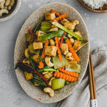 cashew tofu and vegetables stir fry on a plate
