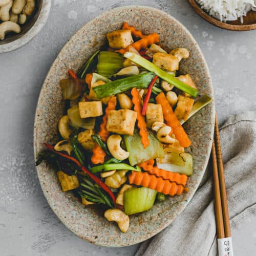 cashew tofu and vegetables stir fry on a plate