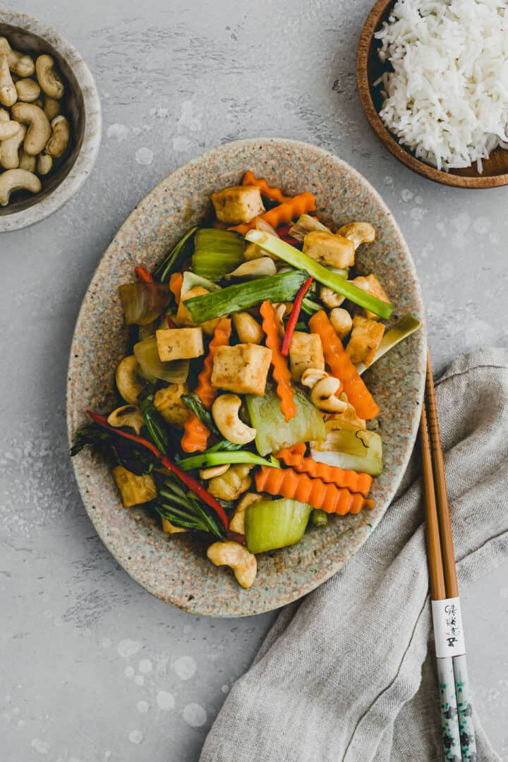 cashew tofu and vegetables stir fry on a plate