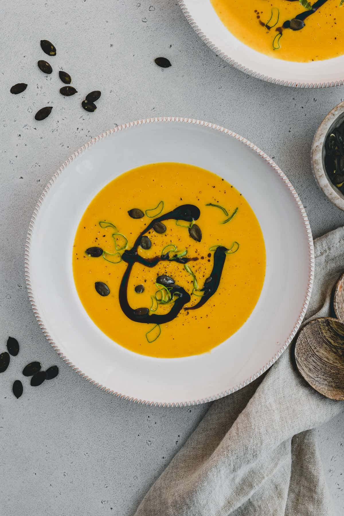 pumpkin soup with potato in a bowl