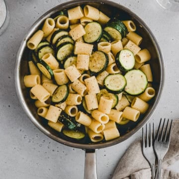 pasta with zucchini in a skillet