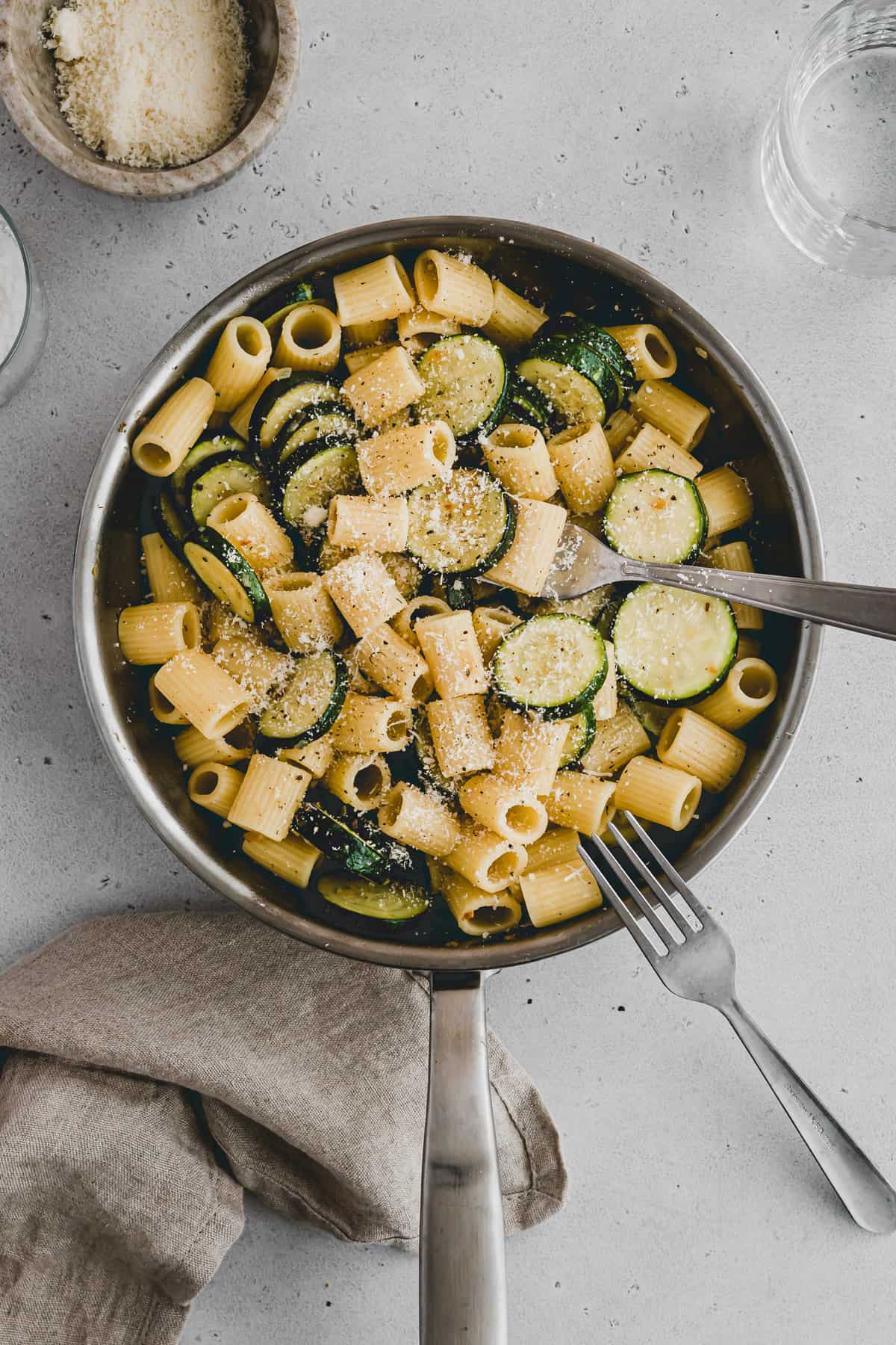 zucchini pasta with parmesan in a skillet