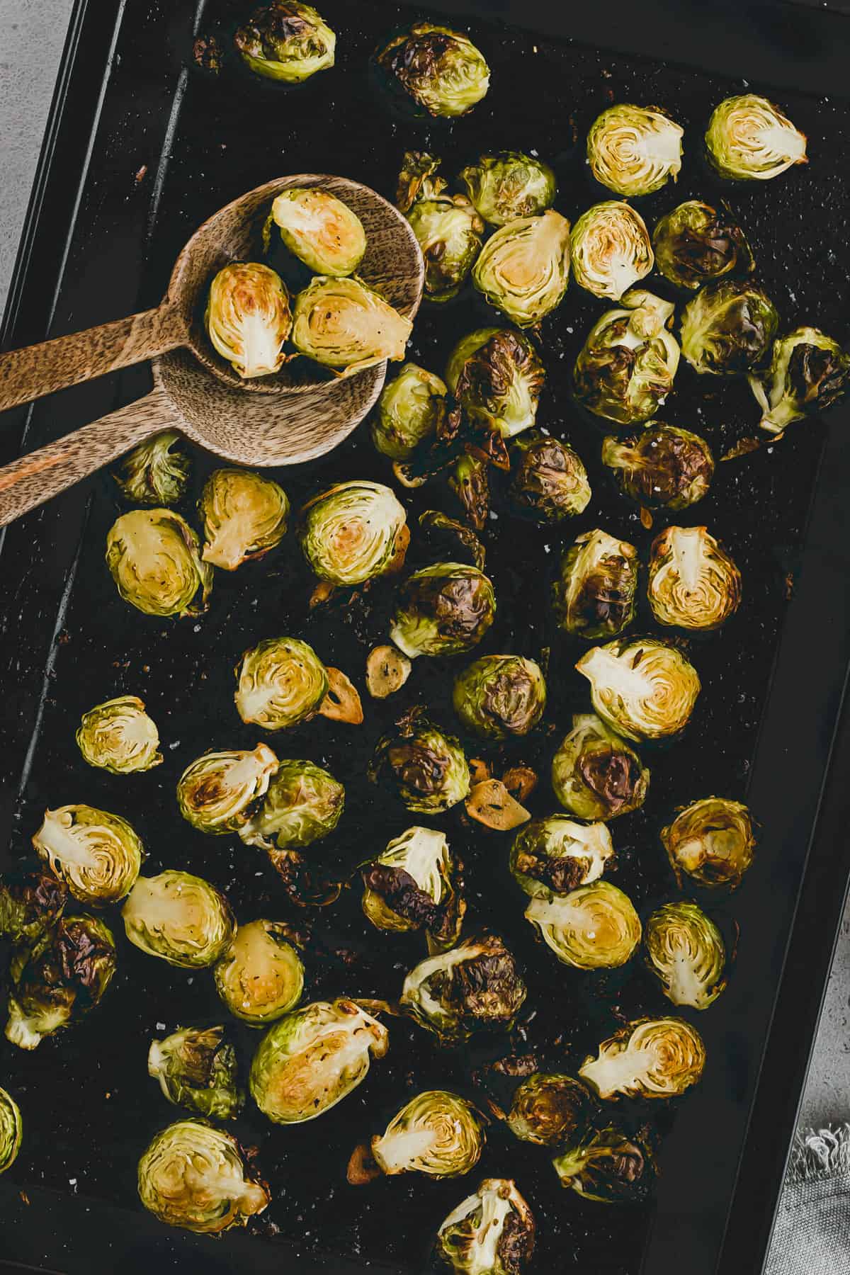 maple roasted brussels sprouts on a baking sheet