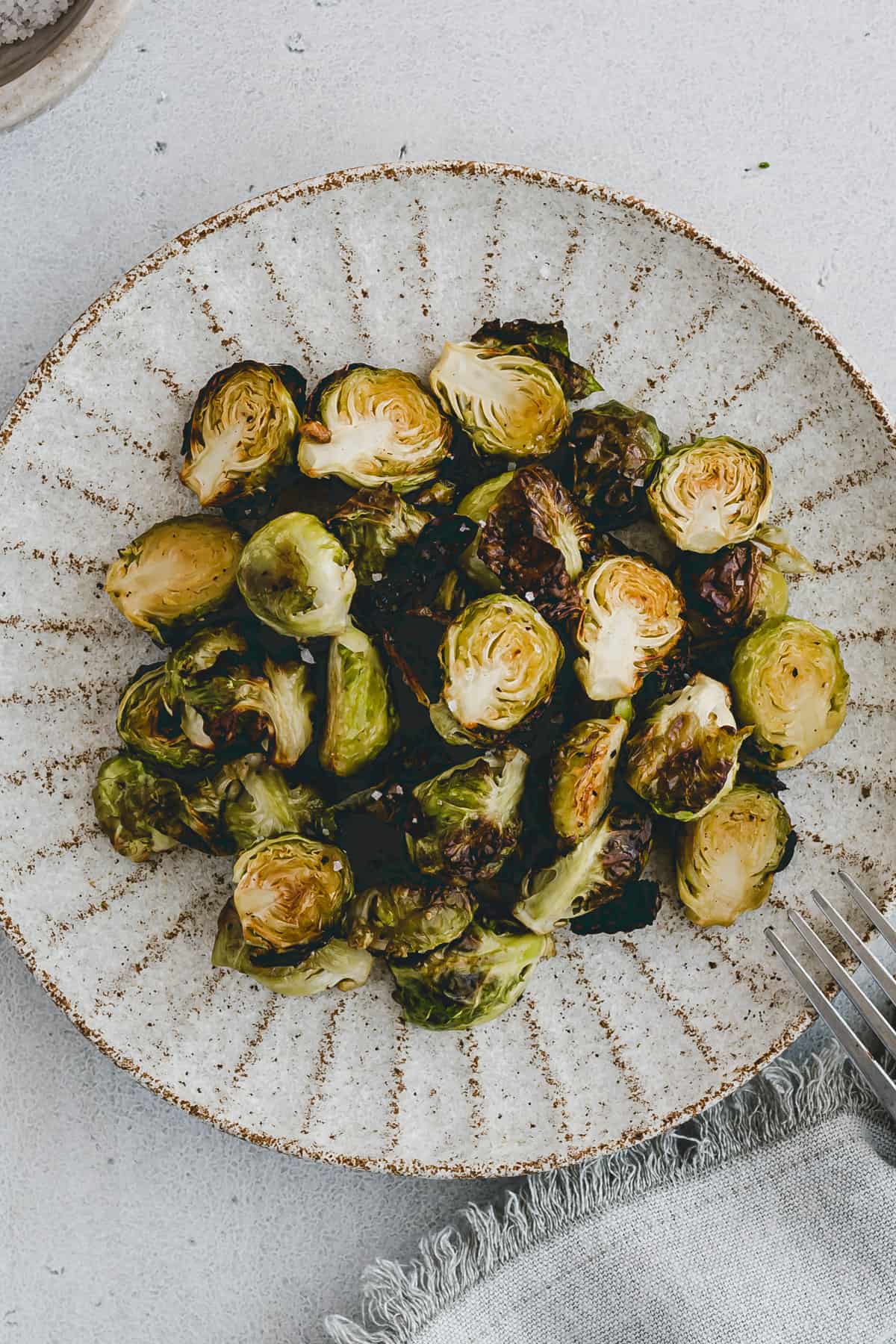 baked brussels sprouts on a serving platter