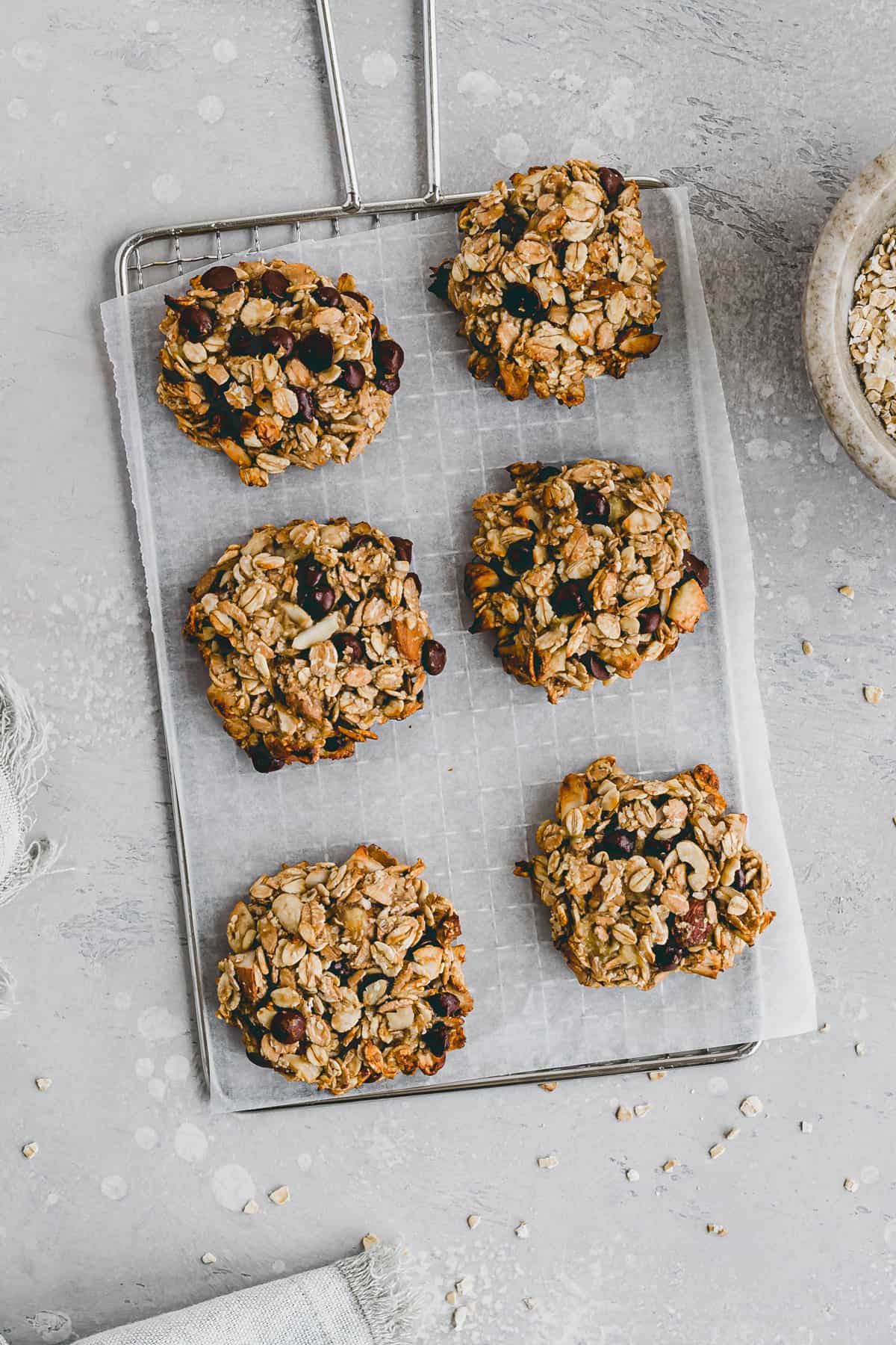 vegan banana oatmeal chocolate chip cookies on a wire rack