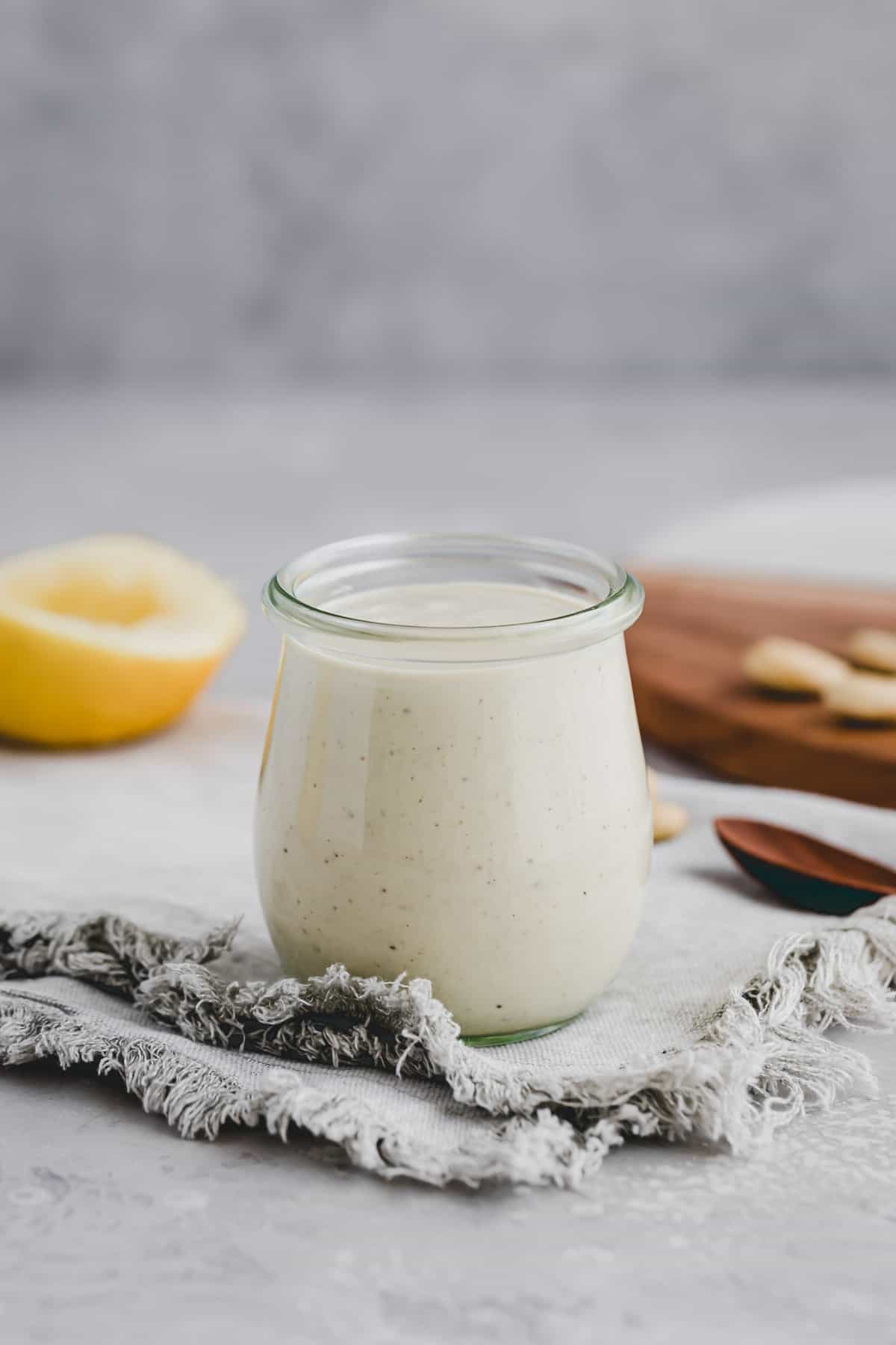 homemade caesar dressing in a mason jar