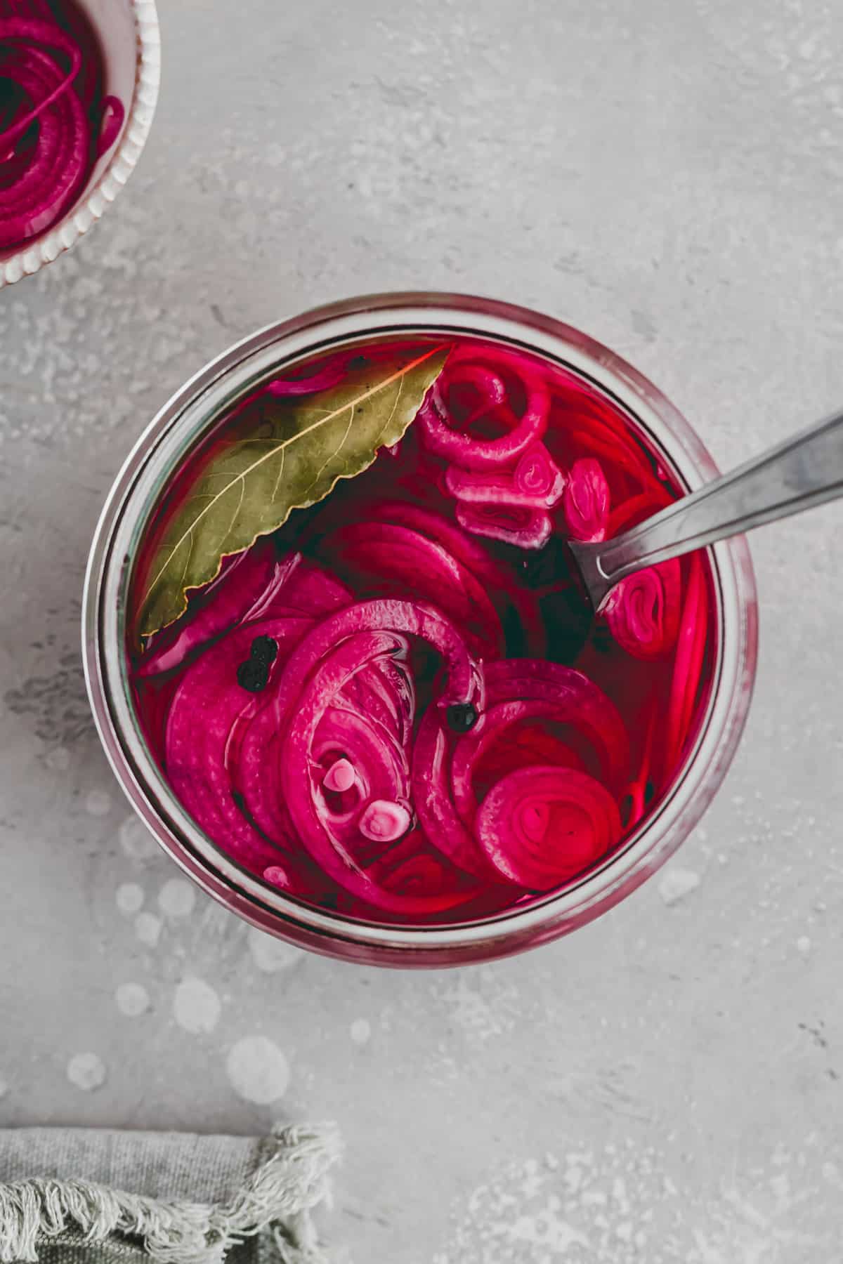 pickled red onions in a jar