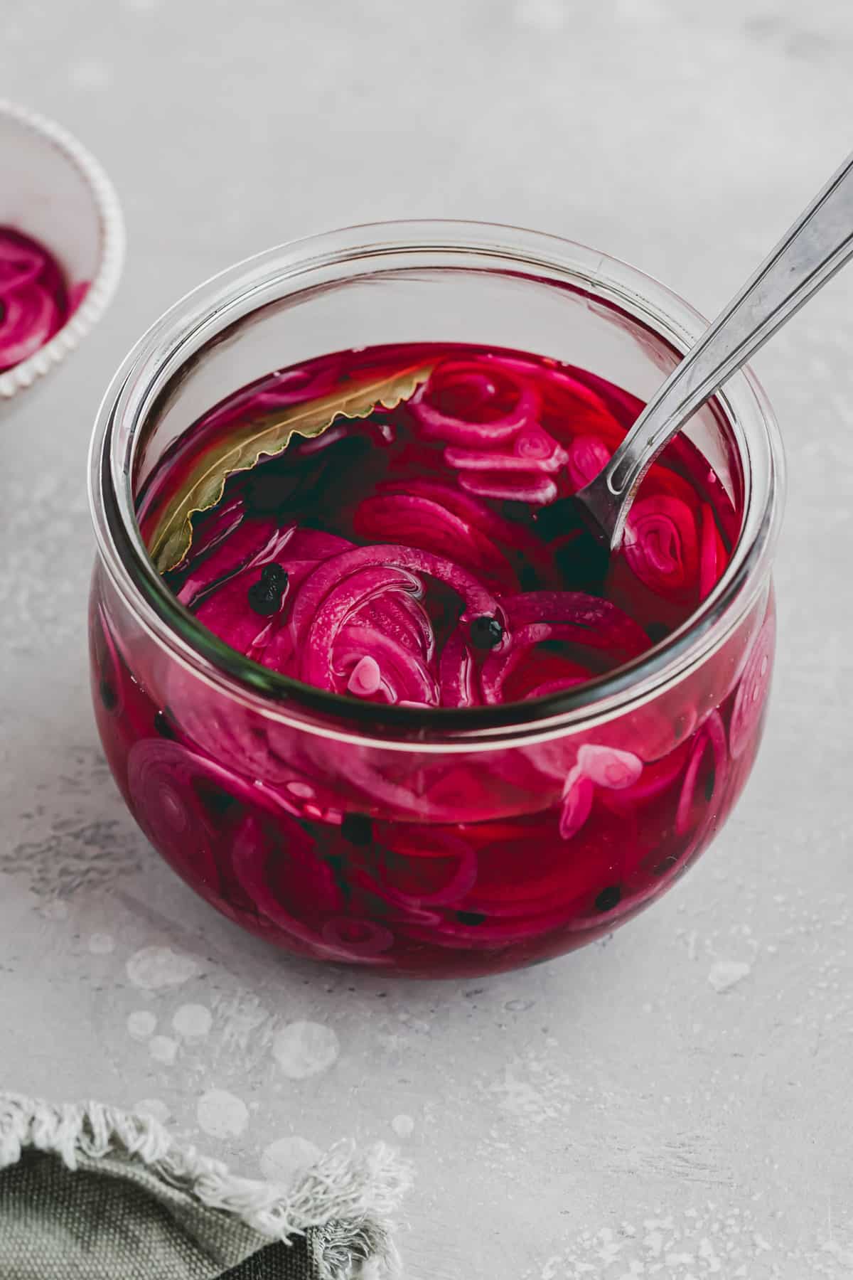 a jar of quick pickled red onions