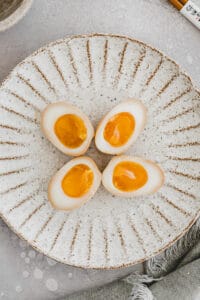 ramen eggs on a plate