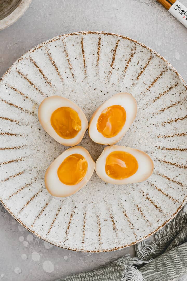 ramen eggs on a plate