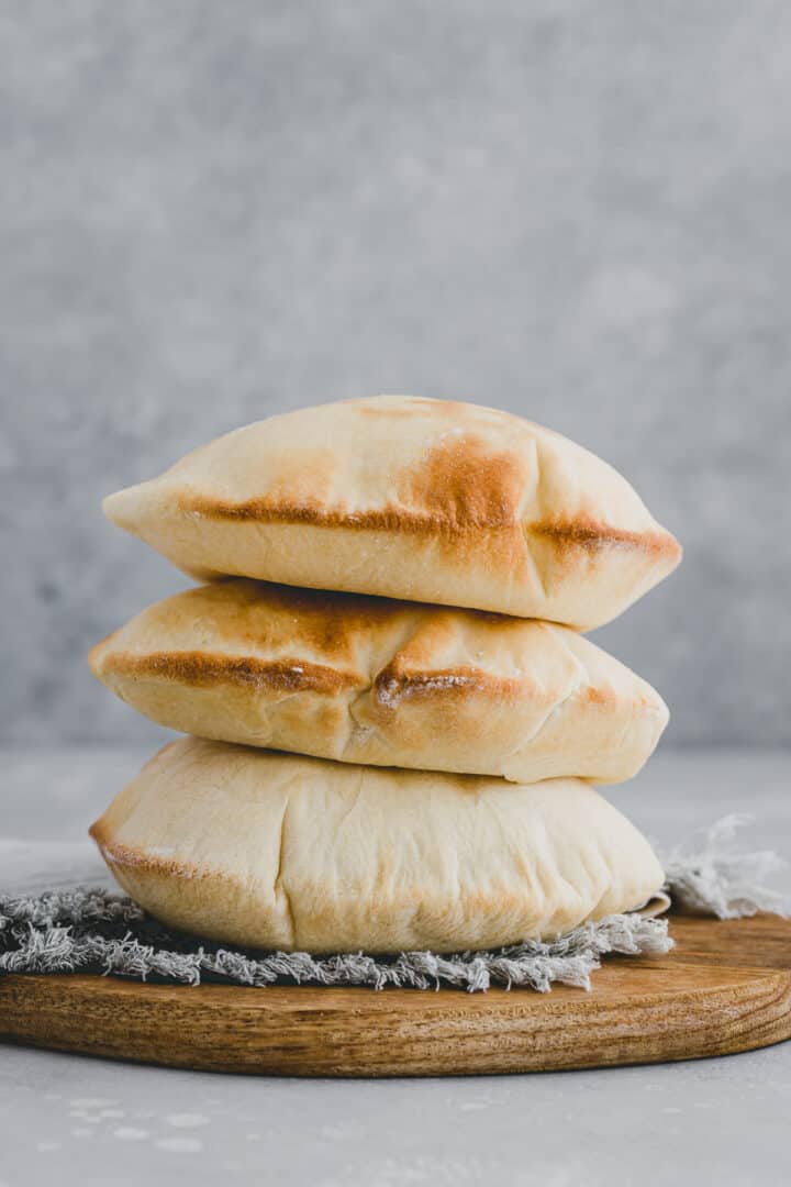 a stack of homemade pita bread