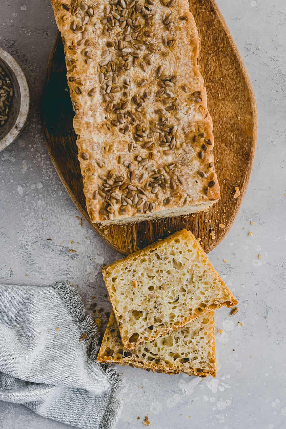 sliced Sunflower Seed Bread on a cutting board