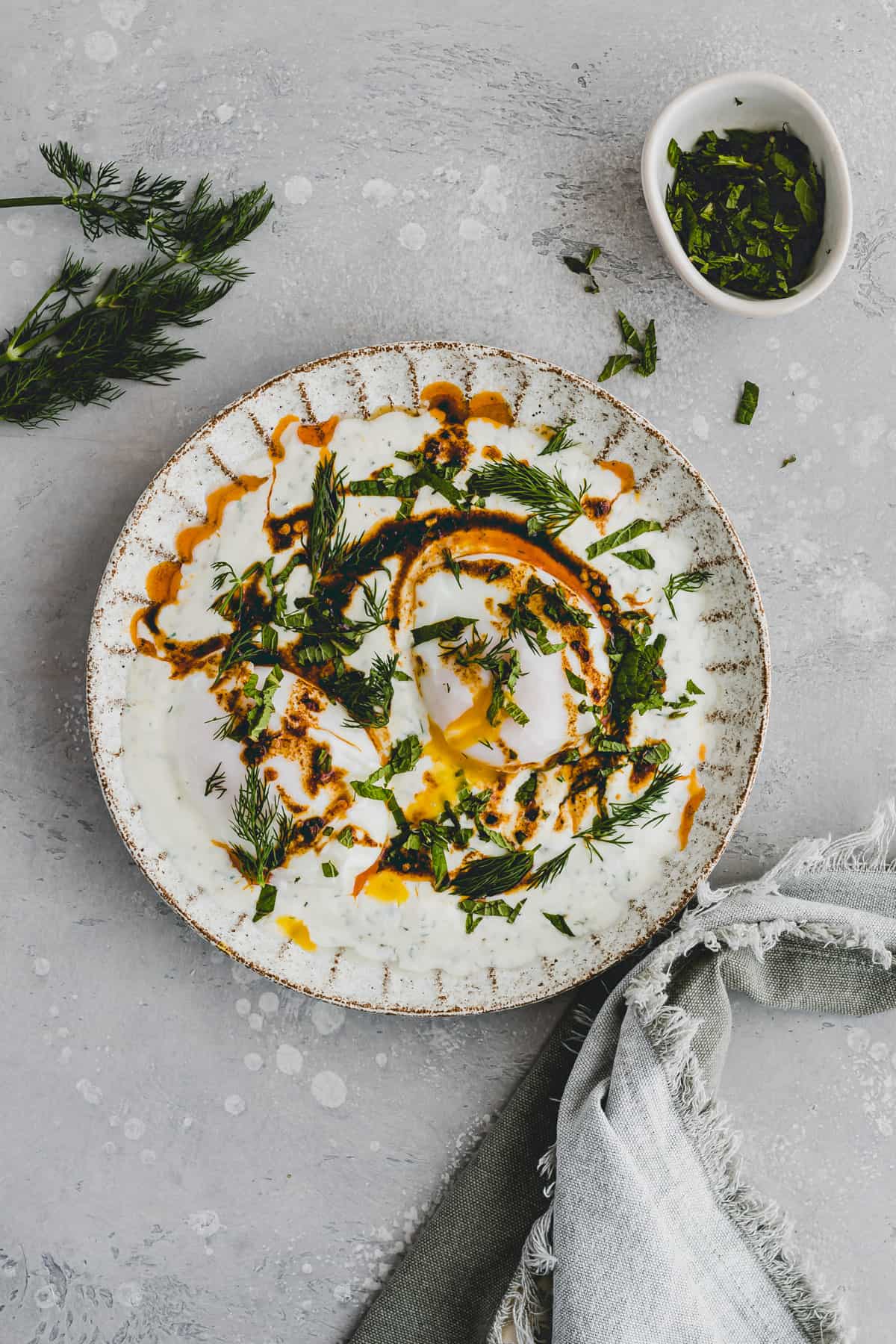 turkish cilbir eggs served on a plate