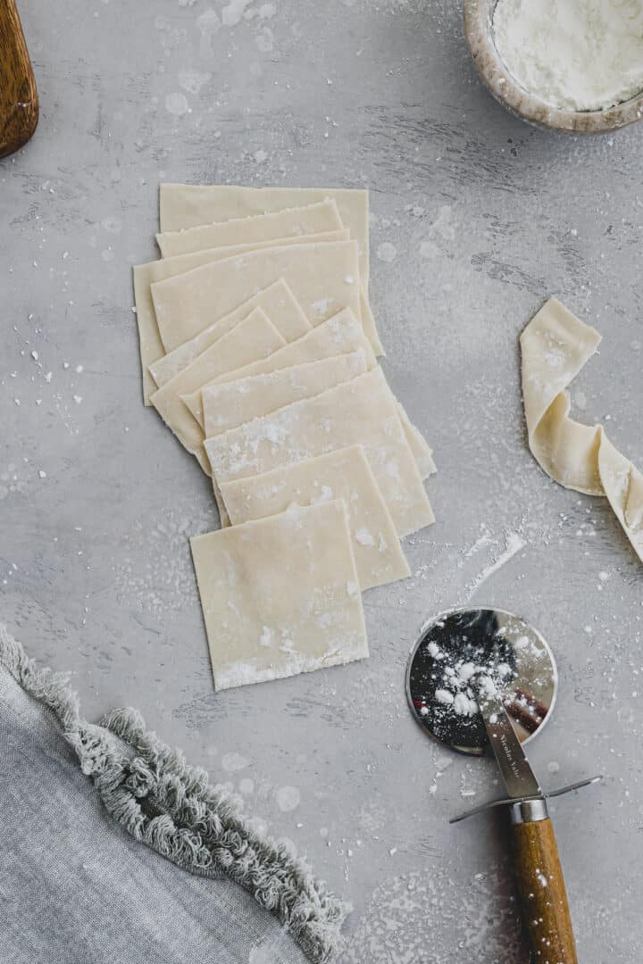 homemade wonton wrappers on a grey plate