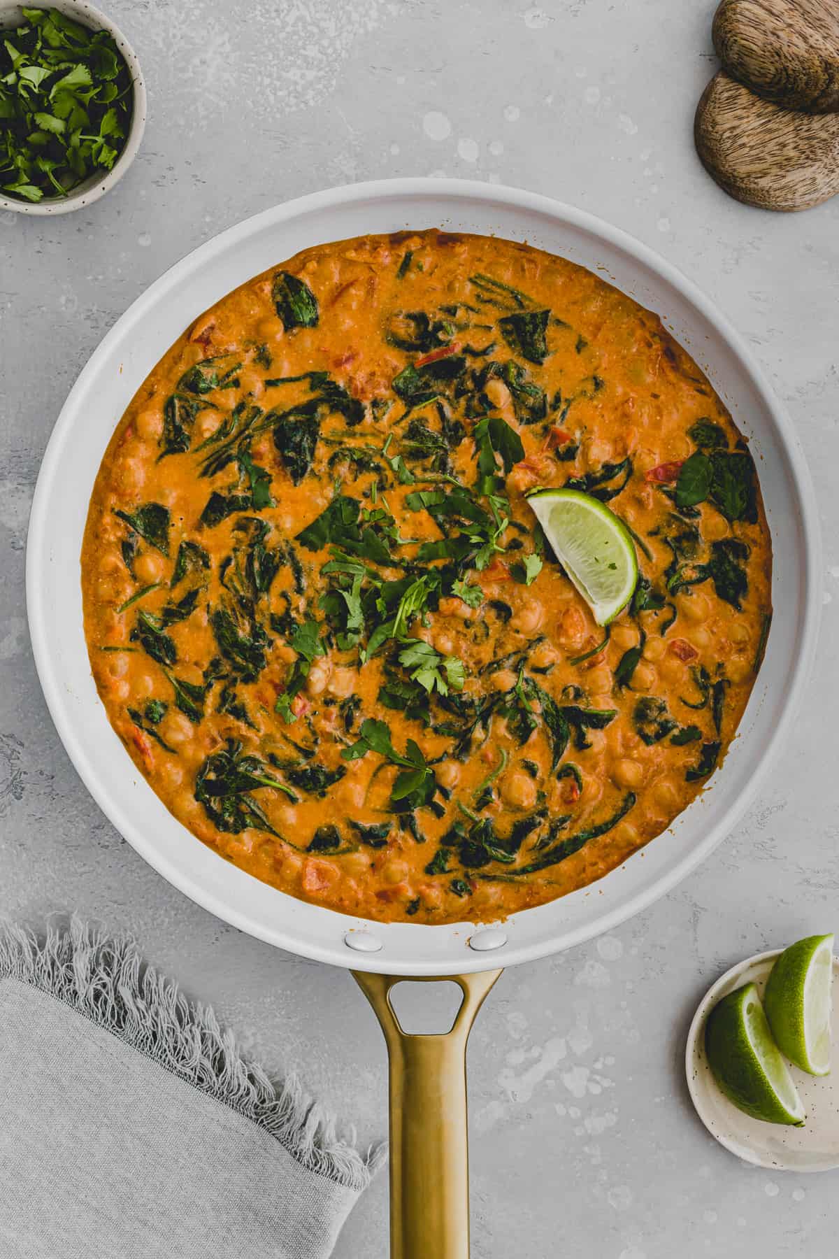 spinach chickpea curry in a skillet