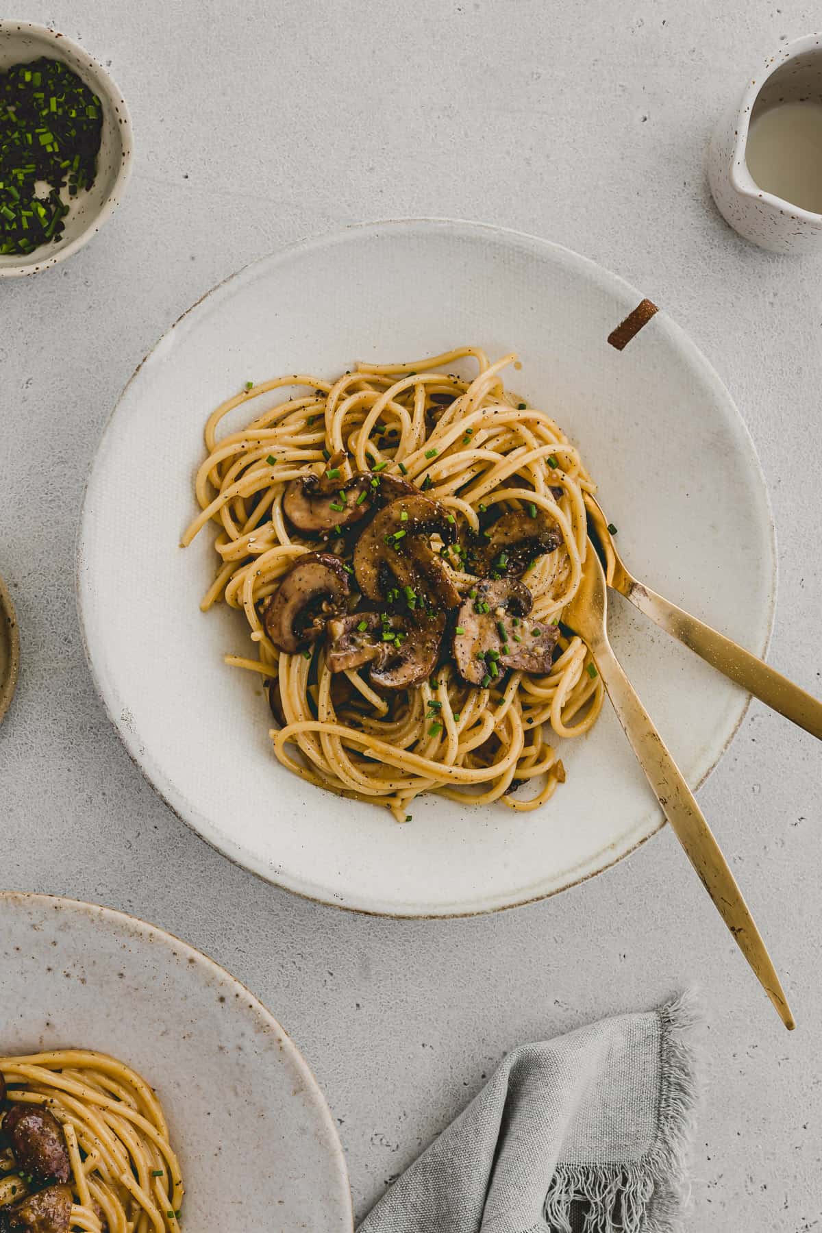 vegetarian carbonara with mushrooms in a pasta bowl