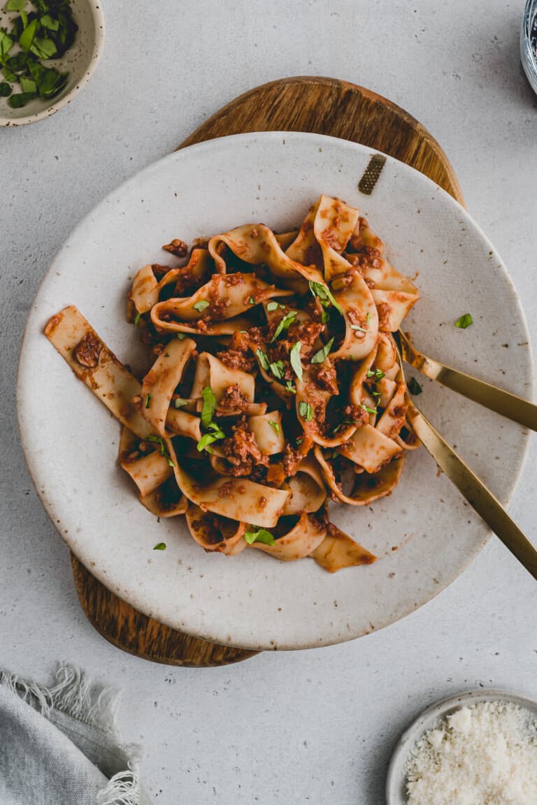 Mushroom Bolognese with walnuts in a pasta plate