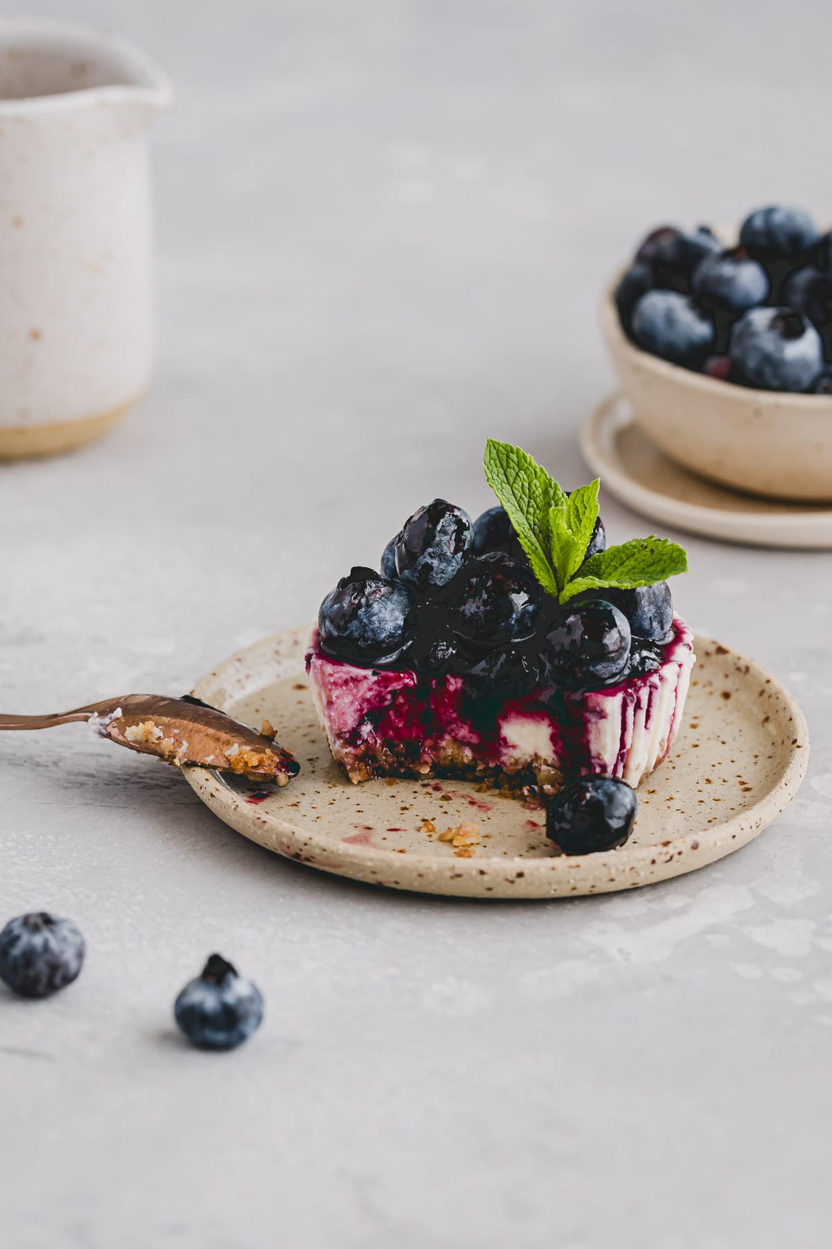 half-eaten mini cheesecake