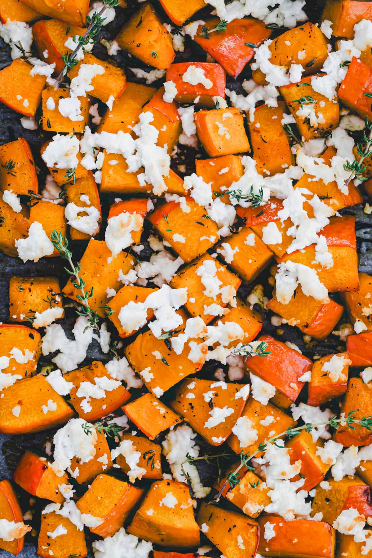 macro shot of roasted squash with feta