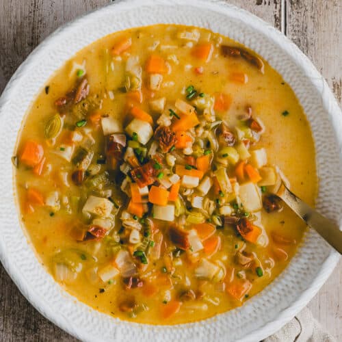 vegetable barley soup in a bowl