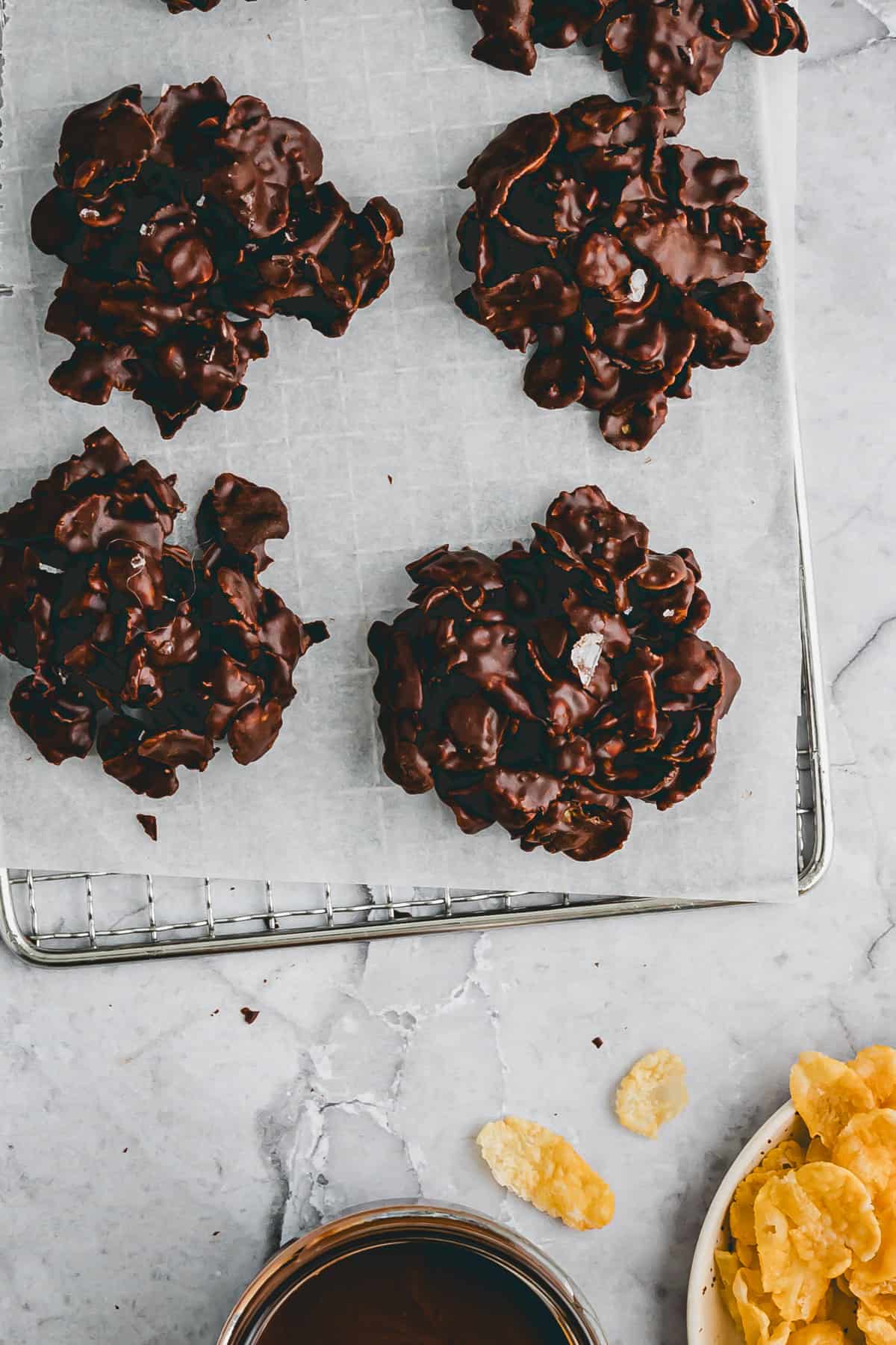 chocolate covered cornflakes on a wire raack