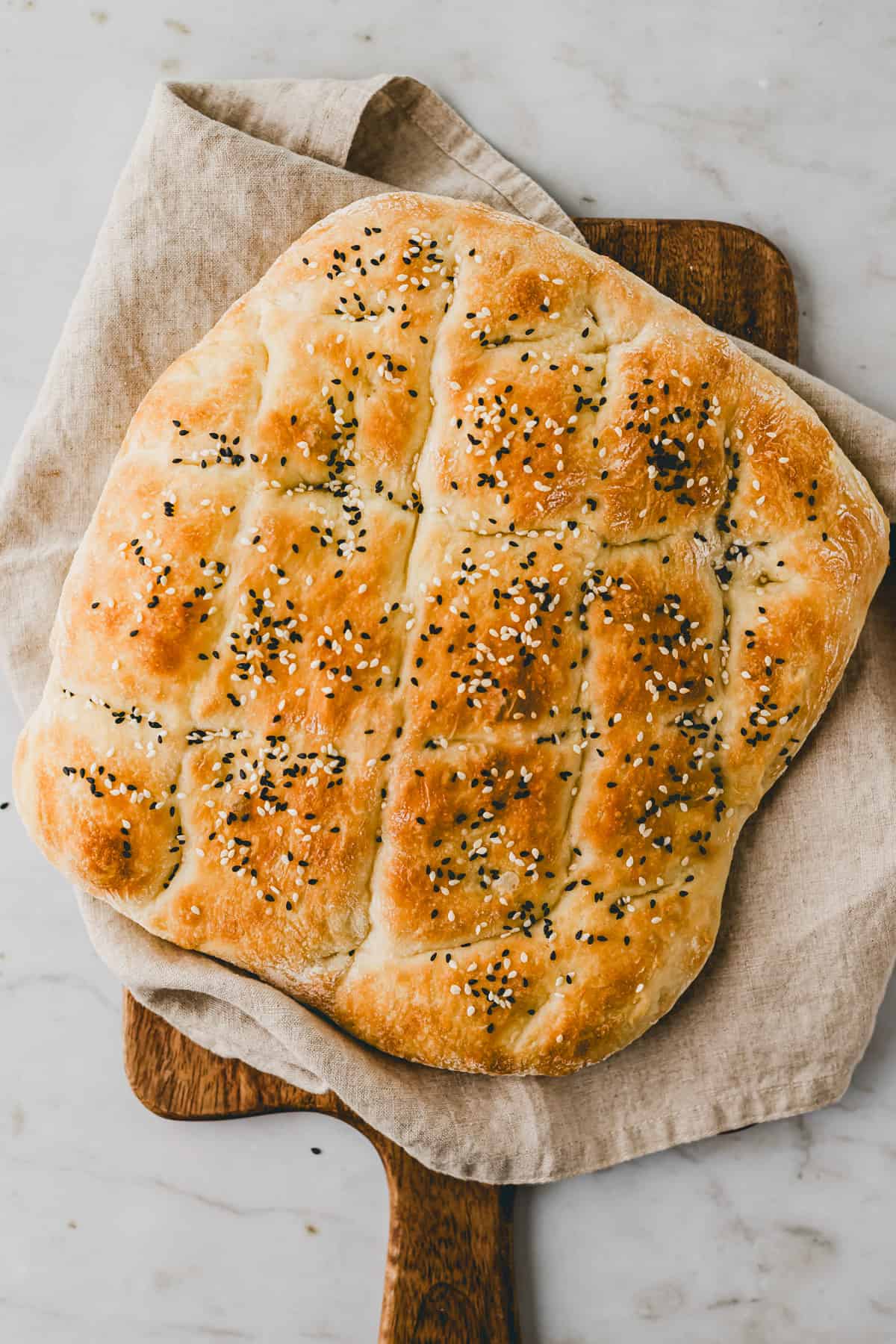 turkish pide bread on a wooden board