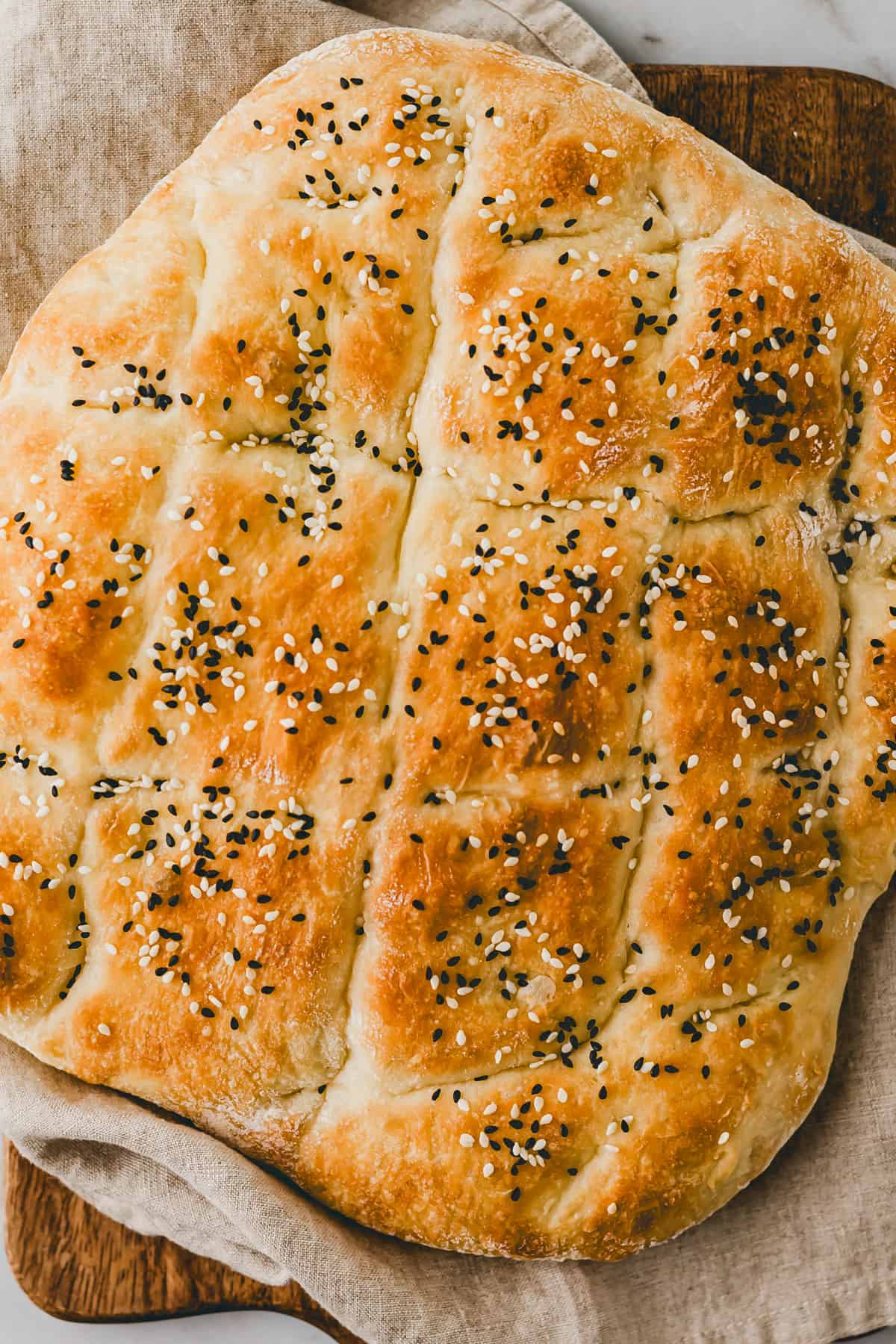 turkish pide bread on a wooden board