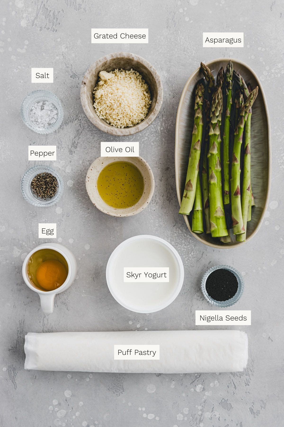 Asparagus Puff Pastry Bundles on parchment paper