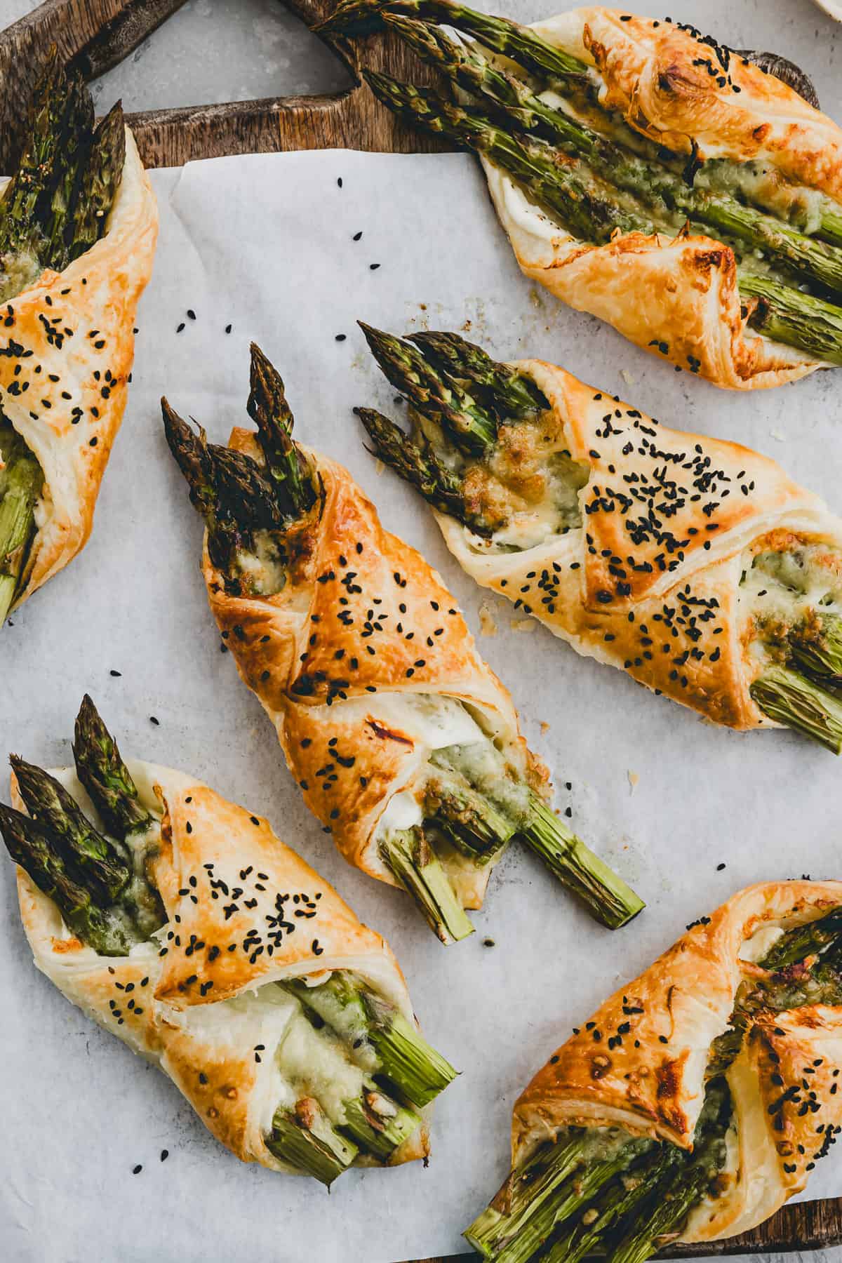 Asparagus Puff Pastry Bundles on parchment paper