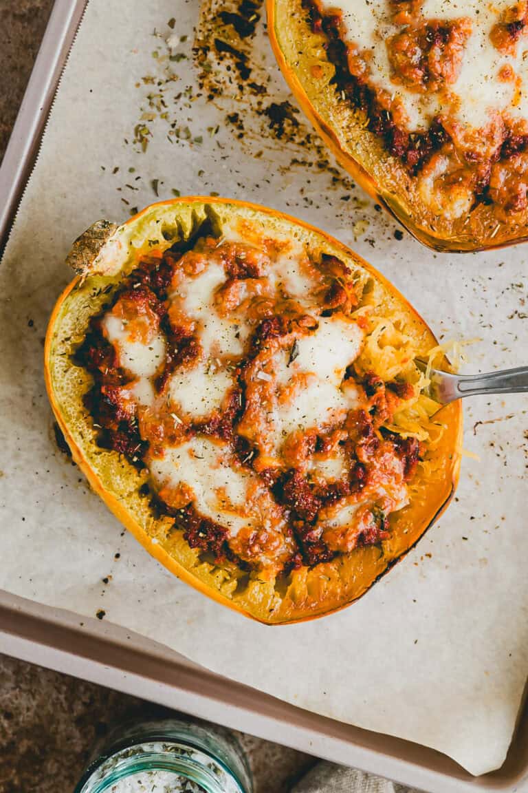vegetarian Stuffed Spaghetti Squash on a baking sheet