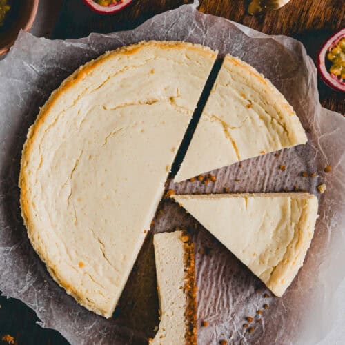 cottage cheese cheesecake sliced on a wooden board