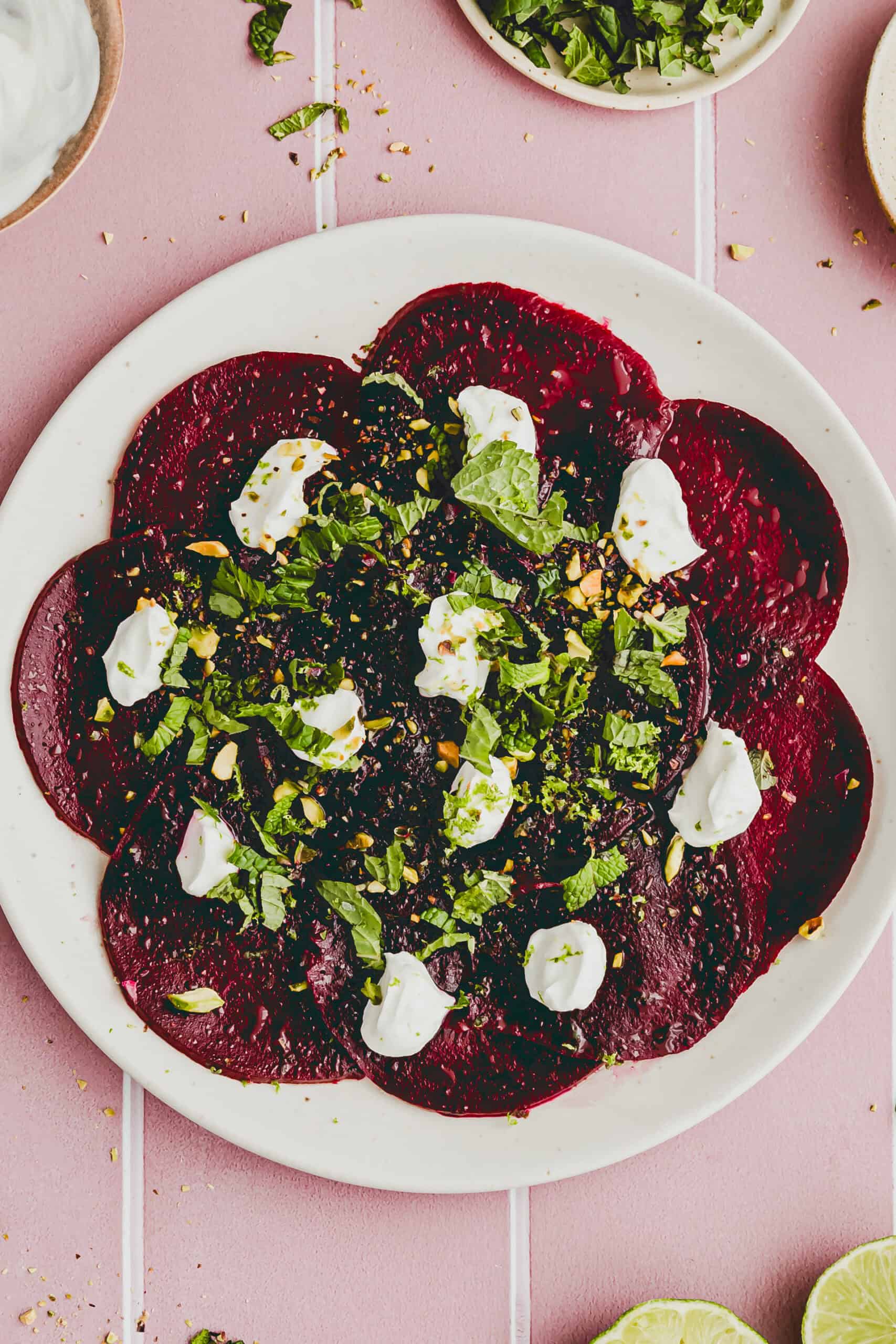 beetroot carpaccio with goat cheese on a serving platter