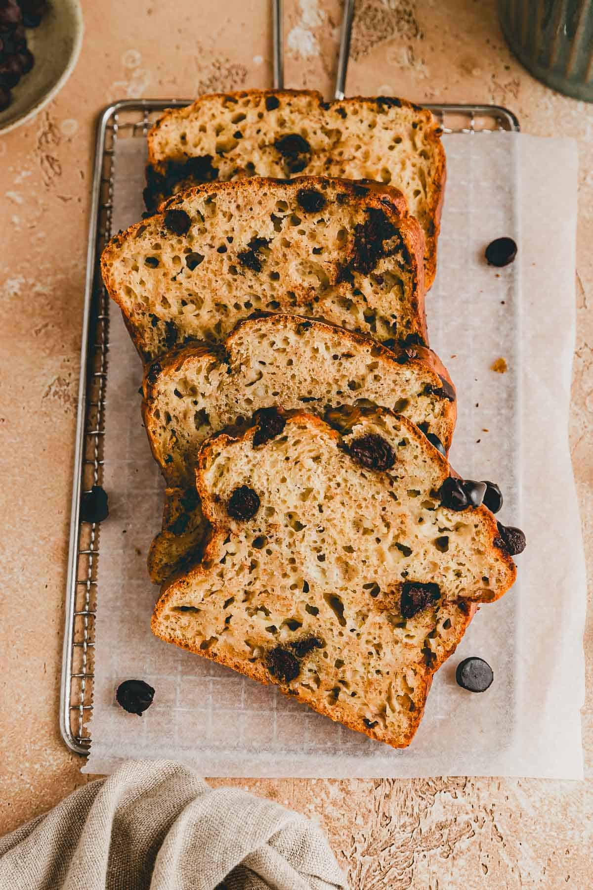sliced banana bread with cottage cheese on a wire rack