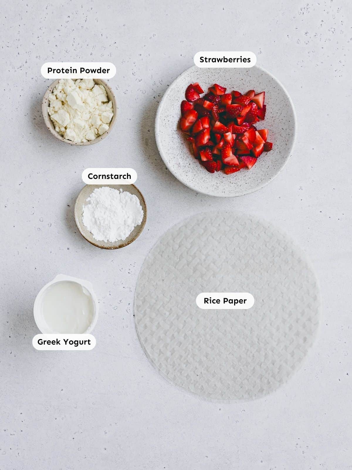 Recipe ingredients filled into small bowls and photographed from above.
